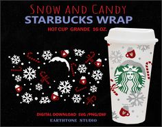 the starbucks cup is decorated with snowflakes and candy canes for holiday decorations