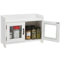 an open medicine cabinet with spices and spice jars in the bottom section, on a white background