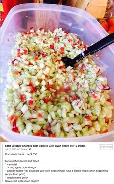 a plastic container filled with chopped vegetables on top of a table