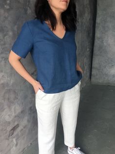 "Handmade washed linen top with short sleeves. Made with love for You. *100% local medium weight linen *Washed eco-friendly linen *Each item is individually cut and sewn by order *The model is wearing size L, blouse color - Blue *Note that colors may look different on your display depending on their settings and technical characteristics. Please let us know if you need different measurements or colors. CARE *Machine wash up to 40 / 104F gentle cycle *Iron inside out at medium high *Do not bleach Short Sleeve Blouse Outfit, Casual Plus Size Outfits, Cotton Short Tops, Linen Loose Dress, Blue Linen Shirt, Linen Top Women, Linen Shirts Women, Short Kurti, Kurti Neck