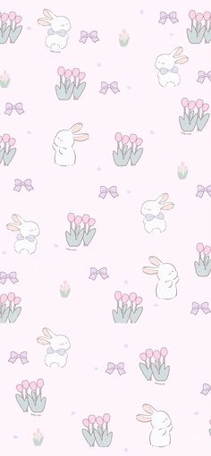 a pink wallpaper with bunny ears and flowers on the bottom right hand corner, in pastel colors