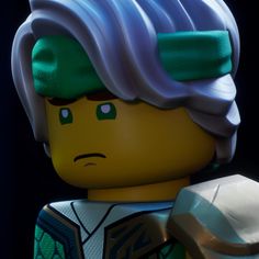 the lego movie character is wearing green hair and holding a white object in his hand