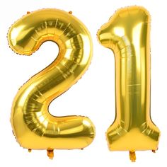 the number twenty two is made out of gold foil balloons and sits in front of a white background