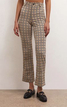 Stand out in the Kastor Houndstooth Pant. Made using our Mid Weight Ponte fabric with an elevated houndstooth print, this high rise, fitted pant features a straight leg and hits at the ankle. Slim fit Mid Weight Ponte: 62% Rayon, 33% Nylon, 5% Spandex Hi-Waisted Slim fit through Hip Pintuck detail at front leg Straight Plaid Ponte Pants, Cheap Houndstooth Pattern Bottoms For Workwear, Cheap Houndstooth Bottoms For Workwear, Houndstooth Pants, Lounge Bra, Spiced Rum, Trend Forecasting, Curves Workout, Pant Shirt