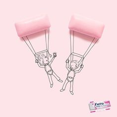 two people are flying with pink candy in the air