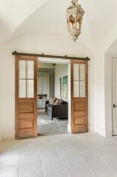 an open door leading to a living room