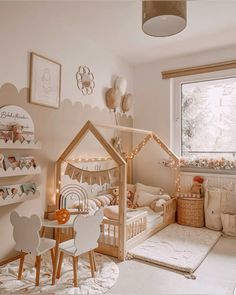 a child's bedroom decorated in neutral tones