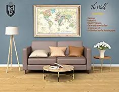 a living room filled with furniture and a map hanging on the wall above it's coffee table