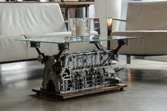 a table made out of an engine is shown