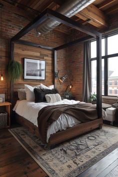 a bedroom with brick walls and wood flooring has a four poster bed in the middle