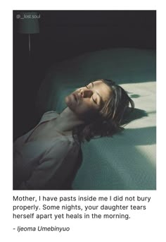 a woman laying on top of a bed next to a light bulb with the caption mother, i have pasts inside me i did not hurry properly