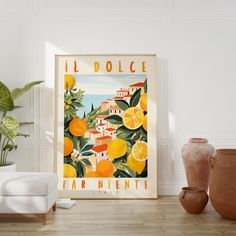 an orange poster hangs on the wall next to two vases and a potted plant