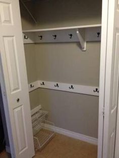 the closet is empty and ready to be used for storing items or other things in