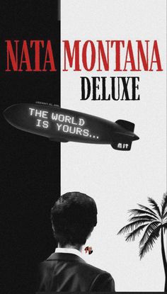 a man standing in front of a sign that says, nata montana deluxe the world is yours