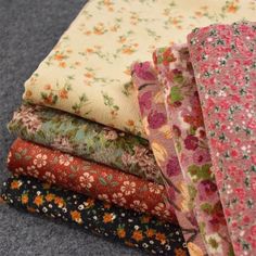 four different fabrics stacked on top of each other