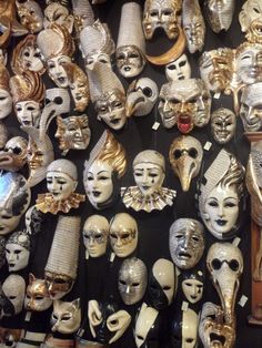 many different types of masks are on display