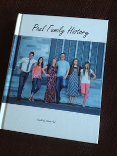 a family history book sitting on top of a table