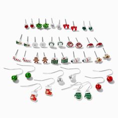 a collection of christmas themed earrings and earring sets, all in different designs on white background