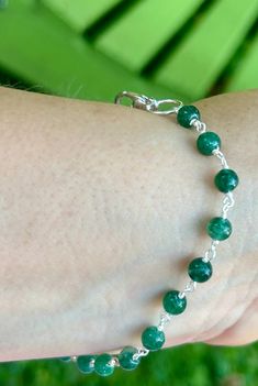 This dainty bracelet contains green aventurine beads. This gemstone represents luck, opportunity and gets its name from the Italian word for 'by chance' or Ventura. I attached a lobster claw clasp so to make the bracelet easy to put on, off. It's very light on the wrist. Note the swirls within each bead. Bracelet Easy, Italian Word, Dainty Bracelet, Hippie Jewelry, Dainty Bracelets, Green Aventurine, Chain Link Bracelet, Lobster Claw, Beaded Bracelet