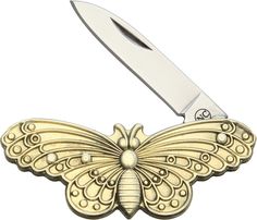 a gold butterfly shaped pocket knife with an open blade on it's back end