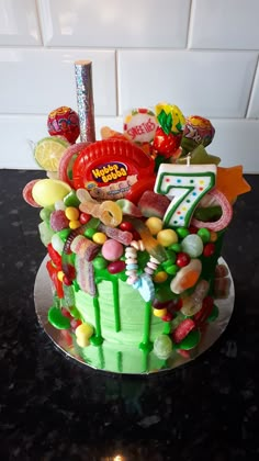 a birthday cake with candy and candies on it