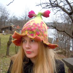 Beautiful bell shaped hat with pink and purple flowers. Unique hat in which you will feel amazingly good. It is from natural material and created with love. Warmth, coziness, pleasure and festive feeling will embrace you. Good mood is guaranteed. A good gift for a good person. This hat is made of 100% wool using wet felting technique. Its made by my hands in my small home studio. Materials: New Zealand sheep wool 100% Hats can be ordered in any colors and sizes. If you want the hat just like in Whimsical Flower Costume Hats For Party, Fun Brimmed Mini Hats For Winter, Fun Winter Festival Hats, Whimsical Winter Hat With Short Brim, Whimsical Wide Brim Winter Hat, Curved Brim Hats For Spring Birthday, Curved Brim Hats For Birthday In Spring, Spring Curved Brim Hat For Birthdays, Whimsical Winter Cap Mini Hats