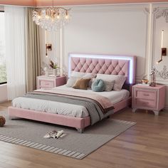 a bedroom with a pink bed, dressers and a chandelier