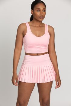 Our Baby Pink Lined Crop Bra Top is a Best Selling style of ours, but now made in the same amazing GH Pleated Tennis Skirt material! It has the same flattering fit on any body type, it offers functionality with removable padding option and support, like the other colors in this style! Just like its name, it can be worn as a sports bra top or dressed differently as an everyday, lounge top. Pink Tennis Skirt Outfit, Gold Hinge Skirt, Tennis Skirt Outfit, Long Leather Coat, Pleated Tennis Skirt, Crop Bra, Tennis Skirts, Chic Sweaters, Crop Top Bra