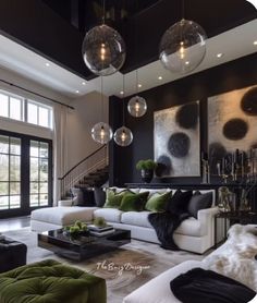 a living room filled with lots of furniture and large glass balls hanging from the ceiling