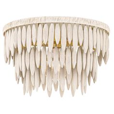 a chandelier made out of wood with white feathers