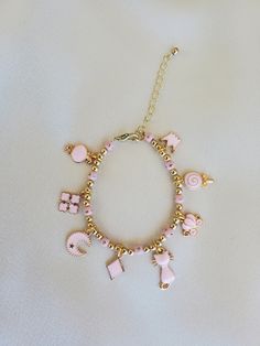 "Adjustable chain, about 6\" smallest and 8 1/2\" biggest Wire, lobster clasp,  plastic beads, metal charms" Affordable Pink Charm Necklaces For Mother's Day, Pink Jewelry Aesthetic, James Avery Charm Bracelet, James Avery Charm, James Avery Charms, Fishing Bracelet, Baby Pearls, Starfish Necklace, Metal Charms