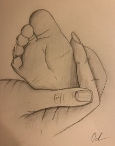 a pencil drawing of a hand holding a baby's foot with the thumb on it