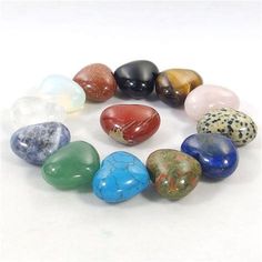 seven different colored stones arranged in a circle