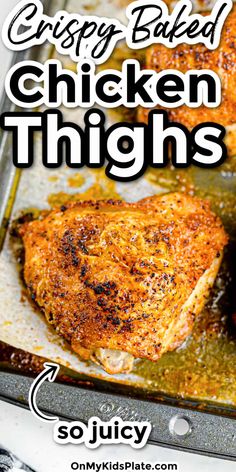 crispy baked chicken thighs in a pan with text overlay that reads crispy baked chicken thighs