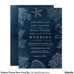 a wedding card with an ocean theme on the front and bottom, in navy blue