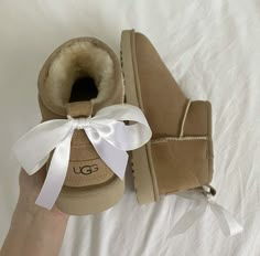 Uggs Mini Boots, Uggs Ultra Mini, Uggs Mini, Preppy Wishlist, Bows Aesthetic, Aesthetic Boots, Ultra Mini Uggs, Ugg Mini Boots, Ugg Boots With Bows