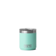 the yeti insulated cup is shown in mint green with a stainless steel lid