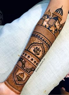 a person with a tattoo on their arm