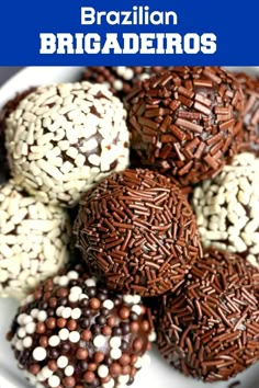 chocolate truffles with white and brown sprinkles are on a plate