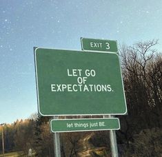 a green sign that says let go of expectations and let things just be exit 3