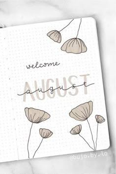 an open notebook with the words welcome august written on it and flowers drawn in pencil