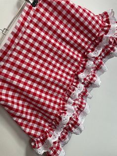 "Cute skirt made from cotton fabric with a gingham print. The length is 13\" so sits above the knee and it has a comfortable elasticated waistband. Two layers of broderie anglais trim really finish off this lovely piece, what's not to love!  If you have any questions or require any further information, kindly get in touch." Cotton Gingham Mini Skirt, Gingham Cotton Mini Skirt, Cotton Gingham Skirt With Ruffles, Gingham Cotton Skirt For Picnic, Cotton Gingham Skirt For Picnic, Plaid Cotton Skirt For Picnic, Plaid Ruffled Cotton Skirt, Plaid Cotton Skirt With Ruffles, Gingham Skirt