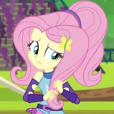 the pinkie is walking around with her hair blowing in the wind