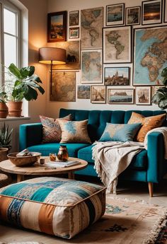 a living room with blue couches and pictures on the wall above them, along with a coffee table