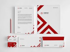 the stationery is designed with red and white lines