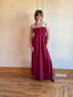 This is a lovely 1970s burgundy slip dress with cream lace detail and shirred tie up Front. Knit poly, good for many seasons and occasions. Polyester  Fits medium / large  Bust - 32" with additional stretch  Waist - 26 - 30" Hips - free Length - 57" Excellent condition Burgundy Slip Dress, Korsett Top, Hippie Dresses, Top Tank, Red Burgundy, Boho Maxi, Cream Lace, Merlot, Large Bust