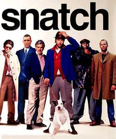 a group of men standing next to each other in front of a sign that says snatch