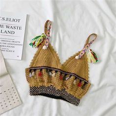 Name:V-neck small halter tank topMaterial:blendedColor:apricot,white,khaki,black ,greenFeatures:embroidered,ethnic style,bohemianSize(cm):free 1inch=2.54cmlength:38,bust:70-90,waist:54-64 Can be adjustedNote:Due to different measurement methods,there will be 1-3 error(unite:cm), please understand.&ltp&gtPlease check the size carefully when you choose items,thank you.</p>&ltbr/> V-neck Halter Top With Built-in Bra For Vacation, V-neck Crop Top With Built-in Bra For Beach, Beach Camisole Crop Top With Built-in Bra, Trendy V-neck Halter Top For Vacation, Spring Festival V-neck Halter Top, Bohemian V-neck Halter Top For Summer, Summer Crochet Top With Built-in Bra, Trendy V-neck Crop Top For Beach, Bohemian Halter Top With Built-in Bra For Summer