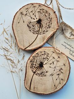 two pieces of wood with dandelions on them