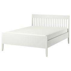 a white bed frame with no sheets on it